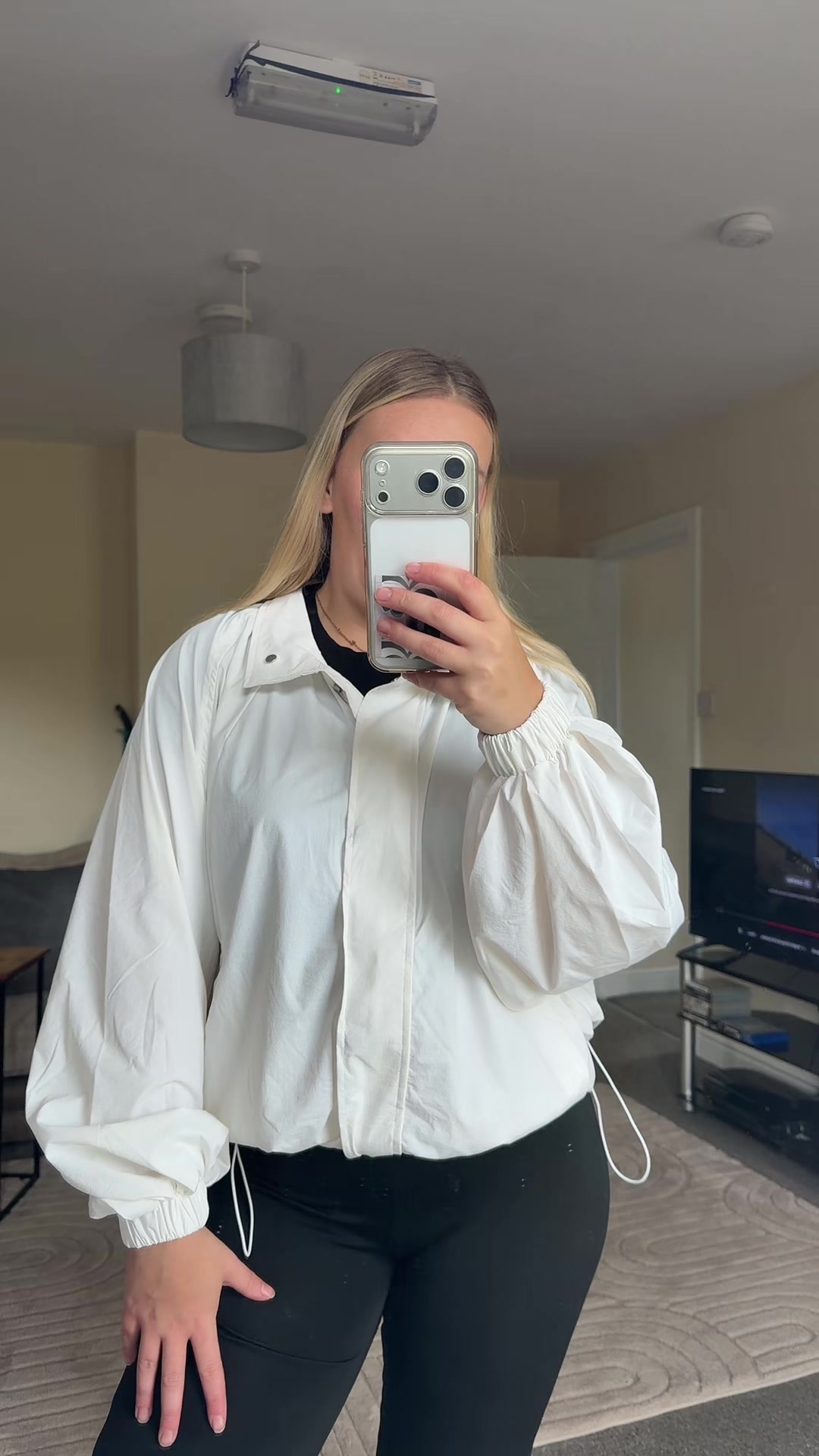 TikTok post by @michaalouisee3 for PUFFIT. Caption reads: [...] white wind breaker jacket from @PUFFIT.UK....