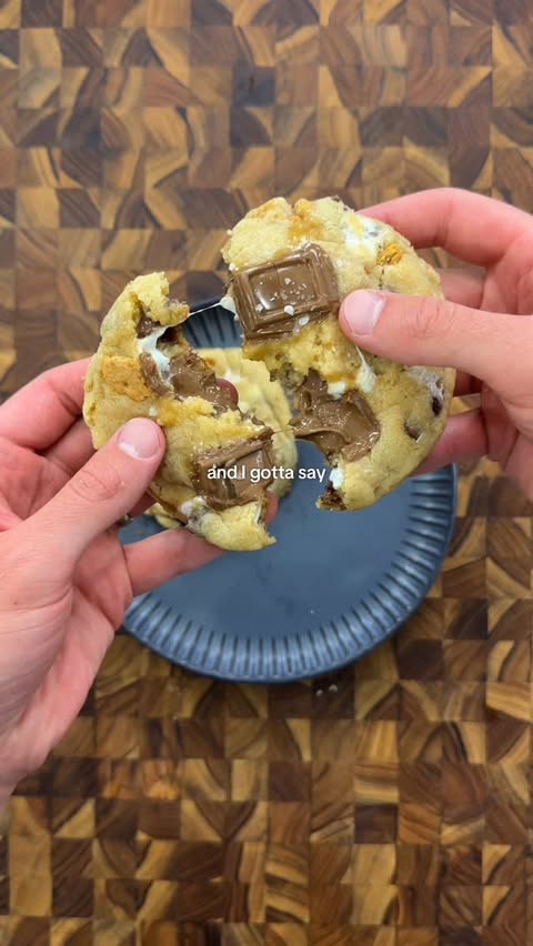 Instagram post by @_samjose_ for Feastables. Caption reads: @feastables caramel s’mores cookie 🍪😮‍💨....