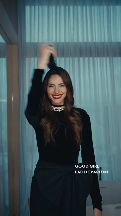 Instagram post by @ilianapapageorgiou for Carolina Herrera. Caption reads: [...] and bold red lips, of course!....