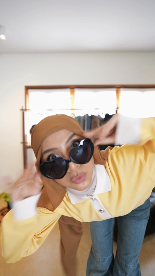 Instagram post by @cikmanggis for Monki. Caption reads: Outdressing cousins like it’s a family tradition.....