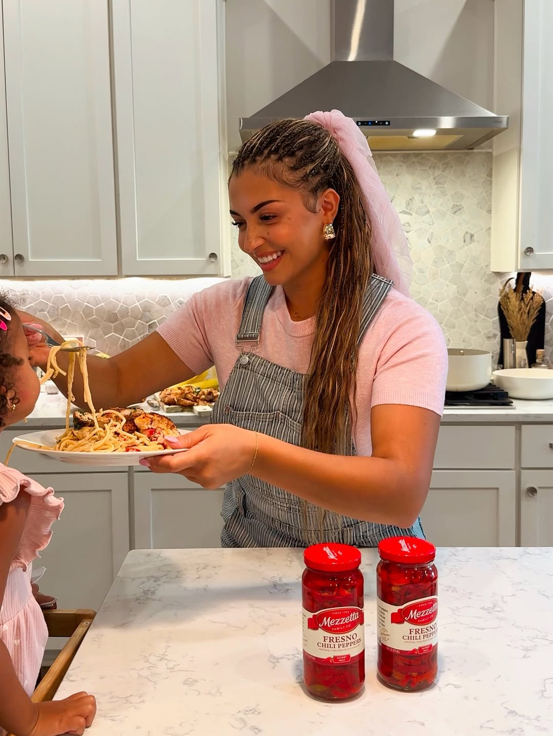 Instagram post by @themayagraves for Kroger. Caption reads: Cooking together, eating together, laughing....