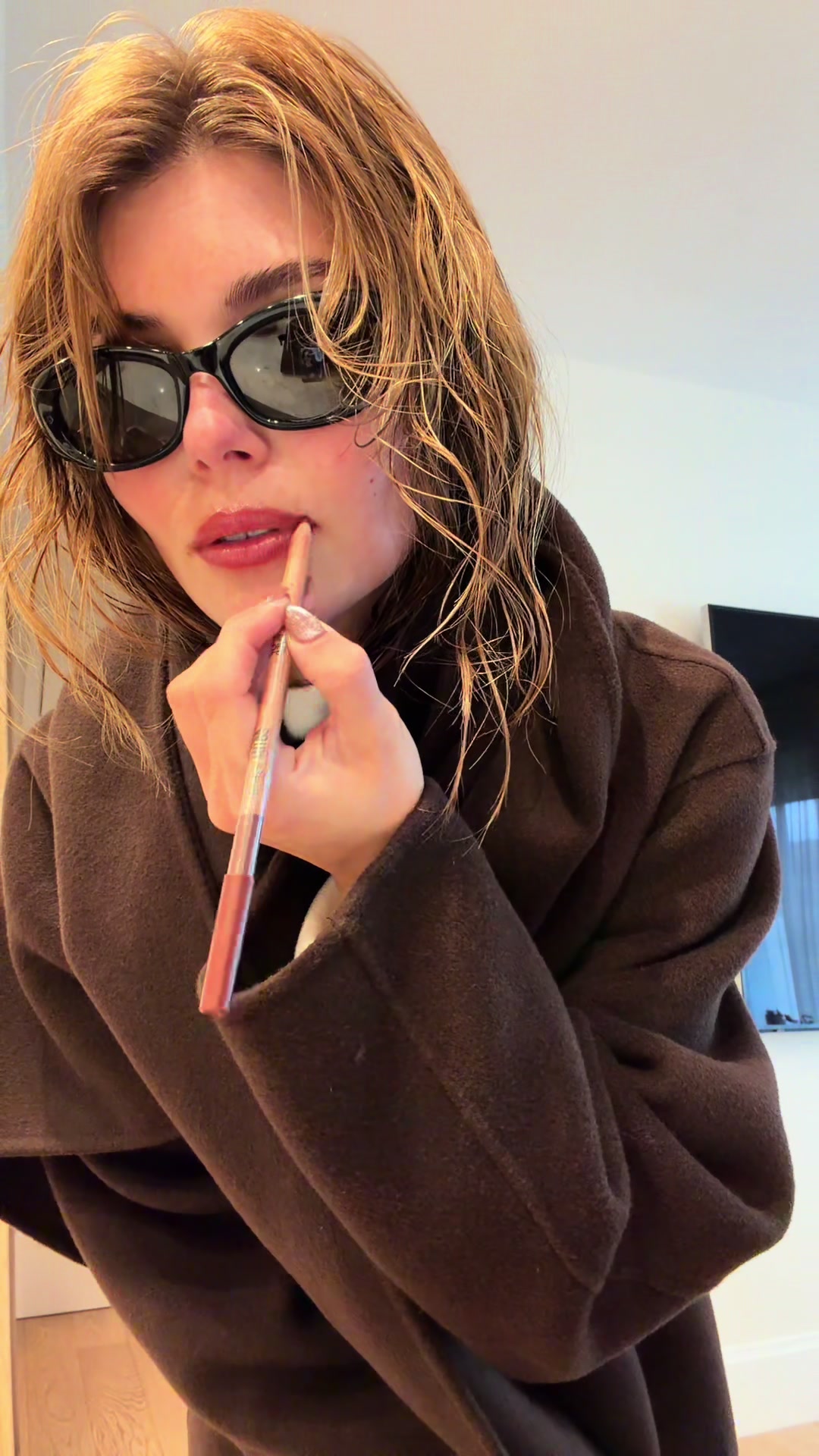 TikTok post by @oliviajadeg for LANEIGE. Caption reads: AD The perfect fall eve in nyc matching the new....