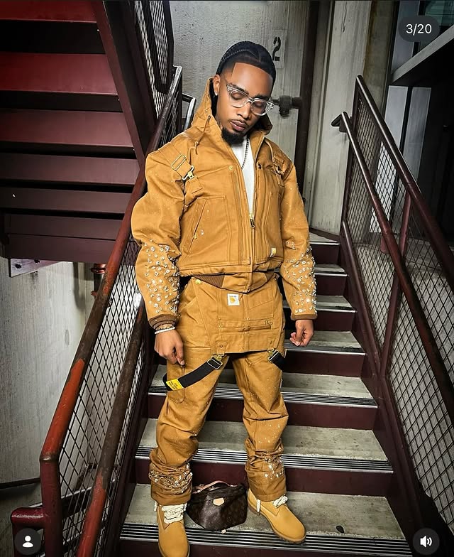 Instagram post by @domozillionairee for Carhartt. Caption reads: [...] for trusting me on your custom....