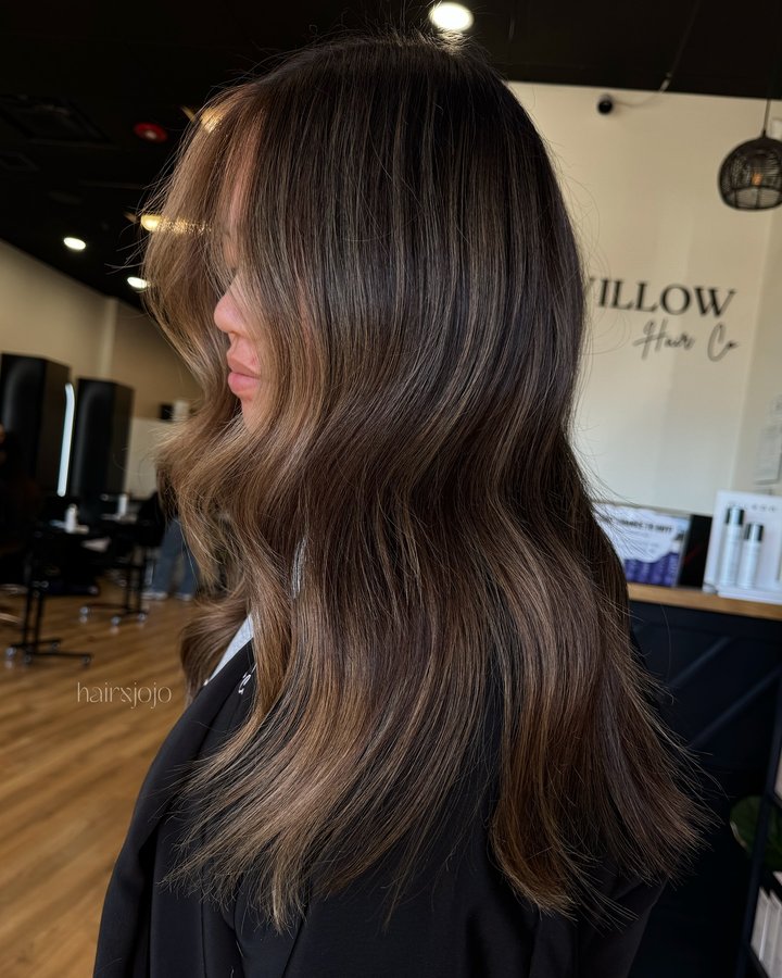 Instagram post by @hairxjojo for Beauty Launchpad. Caption reads: Rich, sultry brunette vibes brought to you by....