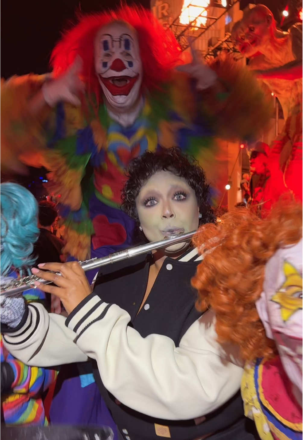 TikTok post by @lizzo for Halloween Horror Nights. Caption reads: HAPPY HALLOWEEN YALL 🎃 @Halloween Horror Nights .