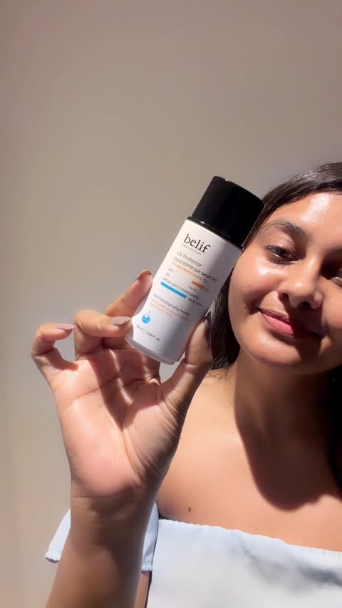 Instagram post by @sakshikomalsingh for belif USA. Caption reads: ✨ Skin Saviour - this sunscreen keeps me protected....