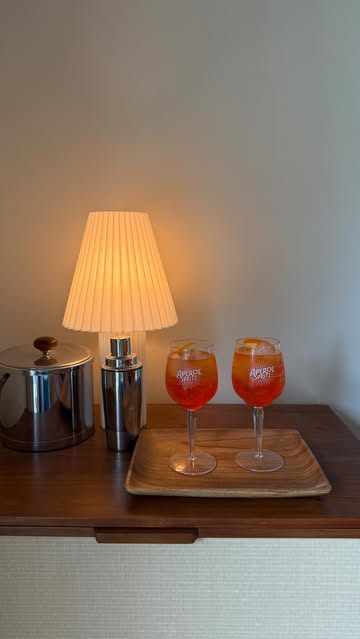 Instagram post by @lincandcanyon for Aperol Spritz. Caption reads: [...] editing was almost as good as these Aperol....