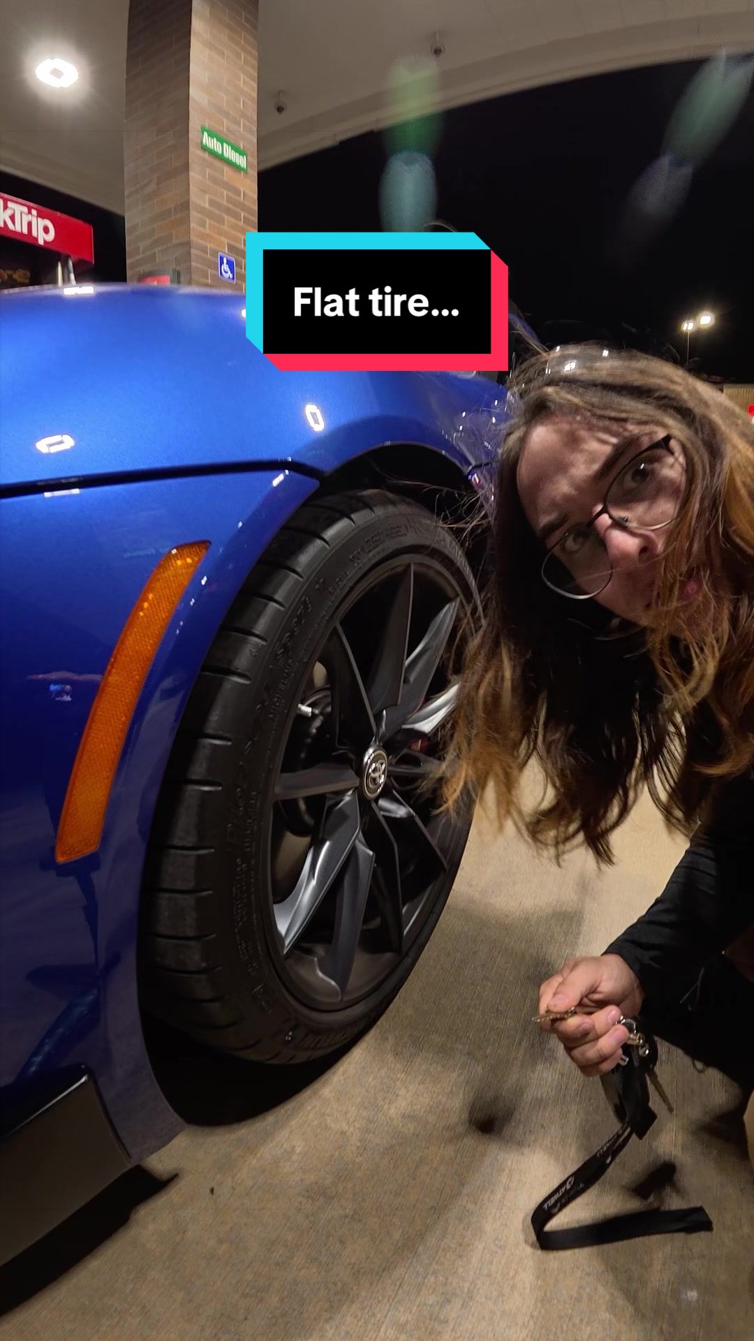 TikTok post by @shanegonzales36 for WolfBox. Caption reads: Supra flat tire😉 @Wolfbox_us.
