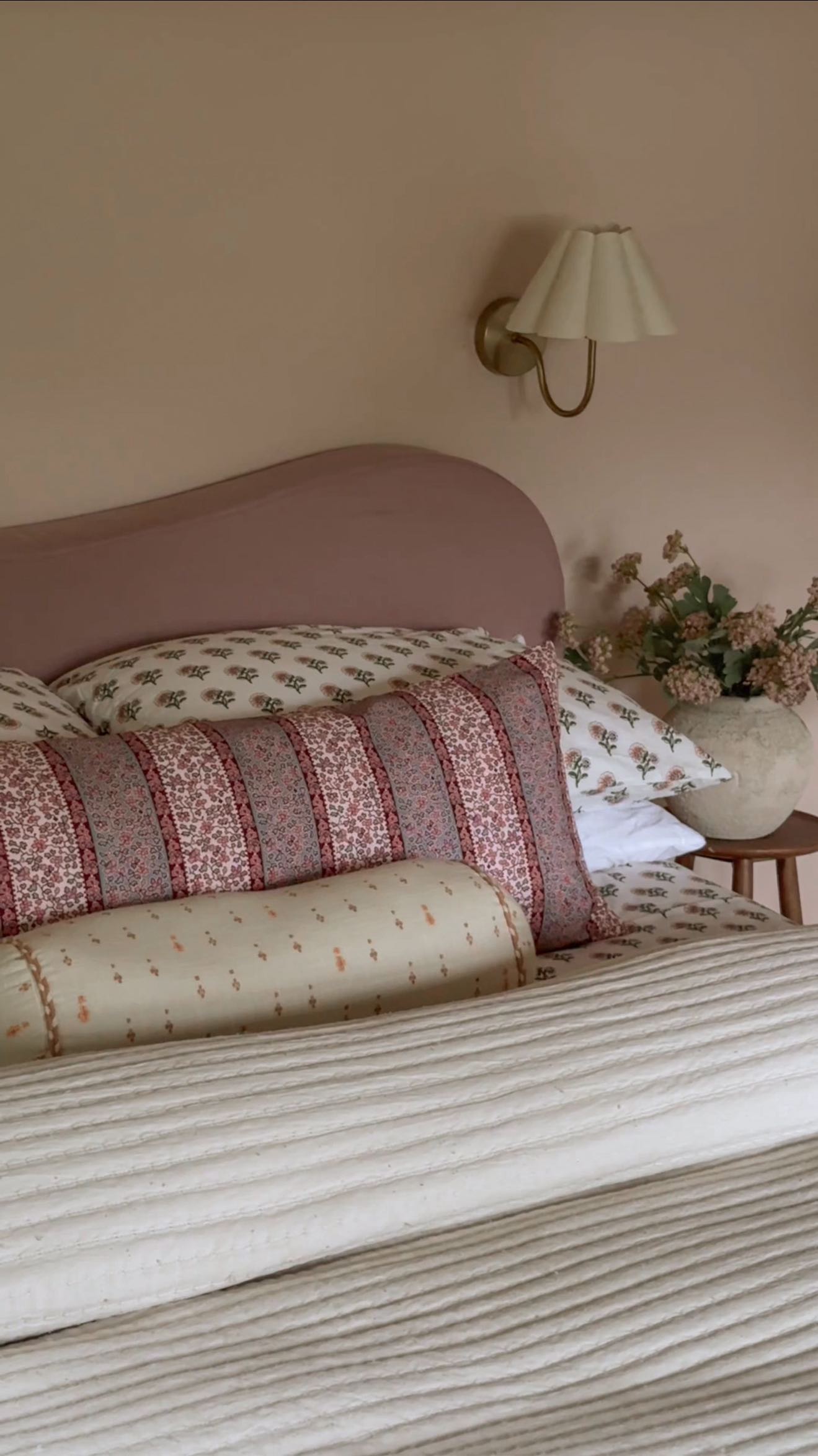 Instagram post by @jhonnycurran for The Company Store. Caption reads: [...] added texture & and pillows from....