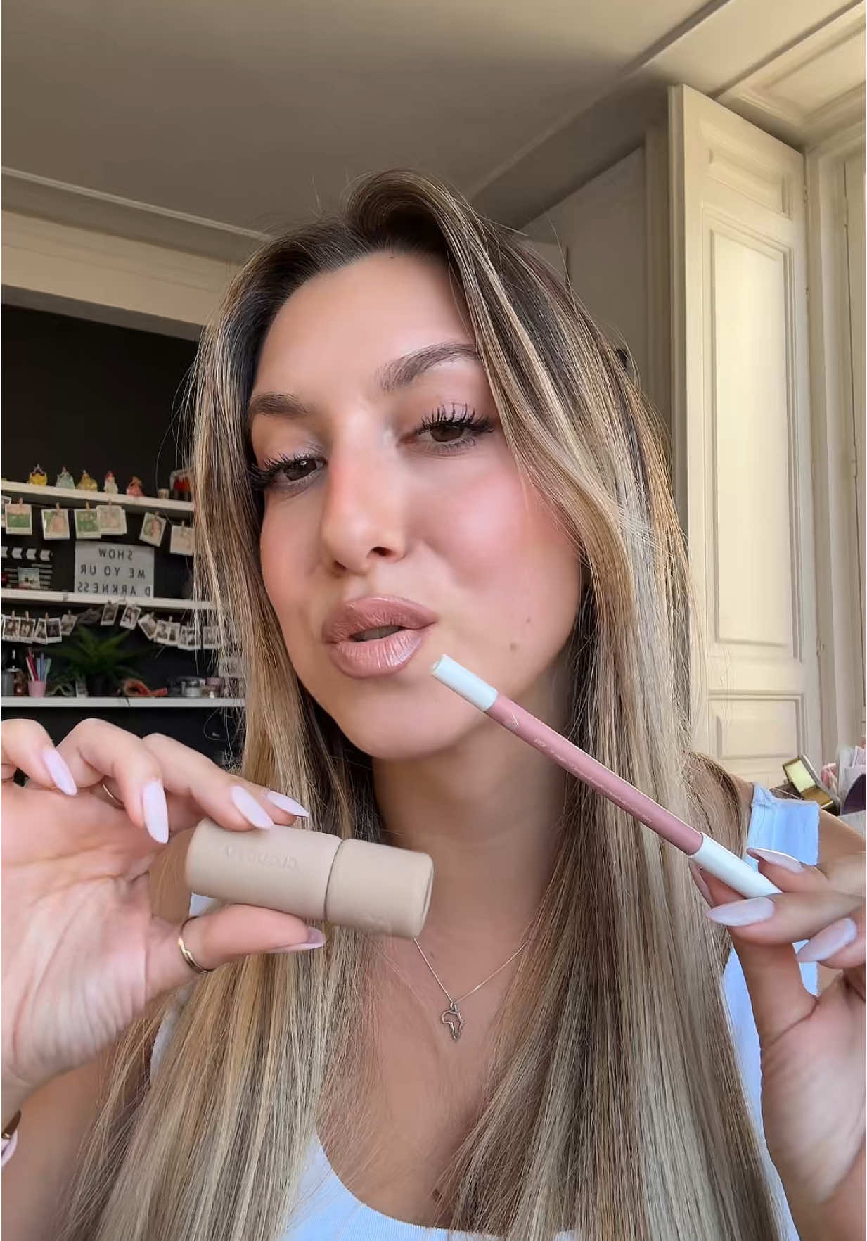 TikTok post by @silviapignatello for Overskin. Caption reads: 🧁✨🤍  @overskin #lipcombo #overskin .