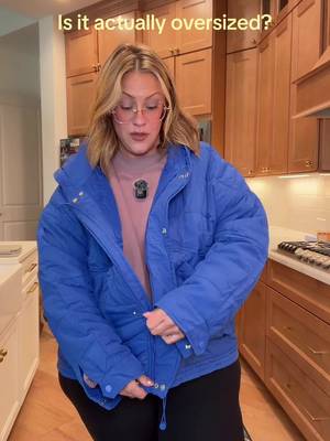 TikTok post by @itsabbyak for Uaneo. Caption reads: @Uaneo #oversizedjacket #plussizejacket [...].