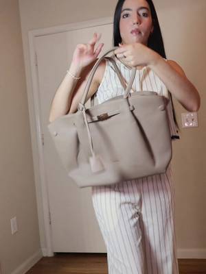 TikTok post by @barbiedori for Newbella Fashion. Caption reads: @Newbella.Fashion #newbella #newbellabags.