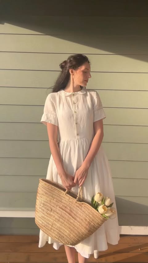 Instagram post by @ourlittlegreencottage for Son de Flor. Caption reads: @sondeflor dresses feel made for slow days. Linen,....