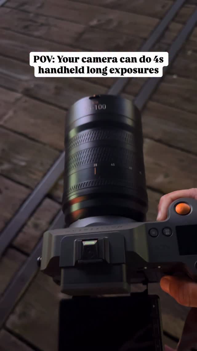 Instagram post by @reggiebphoto for Hasselblad. Caption reads: There’s something beautiful about holding still....