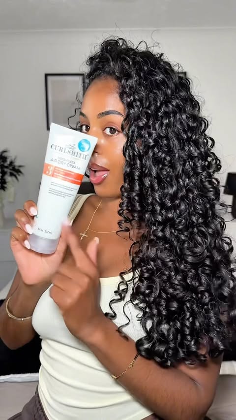 Instagram post by @__claudiasilvaaa for CURLSMITH. Caption reads: AD | It’s never a bad hair day with....