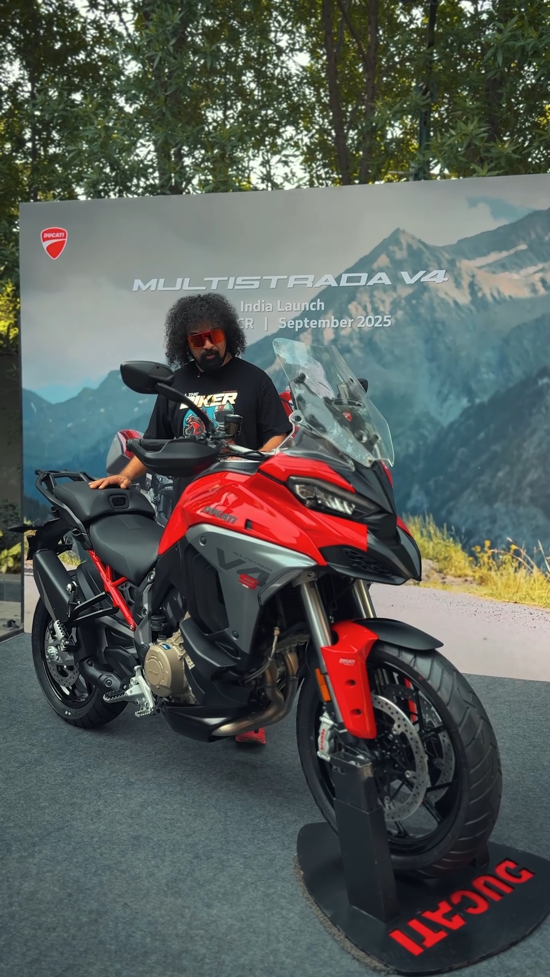 Instagram post by @themotographer for Ducati. Caption reads: Perfect Sunday morning with 40+ Ducatis rolling....