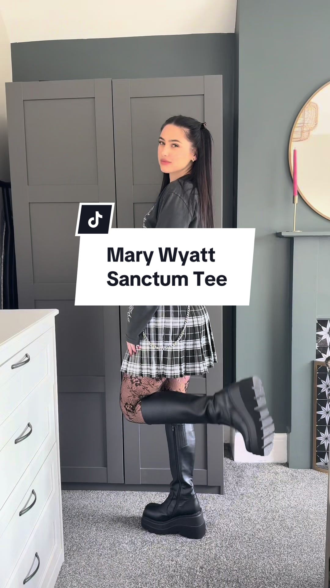 TikTok post by @grace_archives for Mary Wyatt London. Caption reads: Styling the Mary Wyatt Sanctum tee & vegan belt 4....