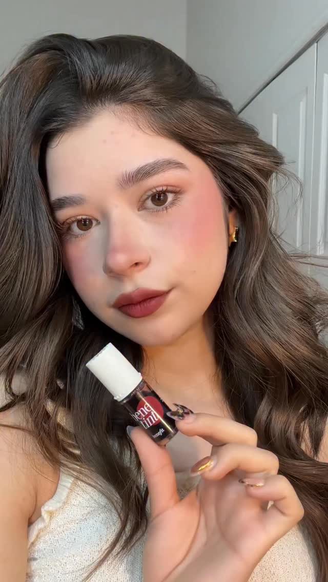 Instagram post by @gretacamposz for Benefit Cosmetics. Caption reads: Dark Cherry Benetint 🍒
@benefitmexico 

#makeup....