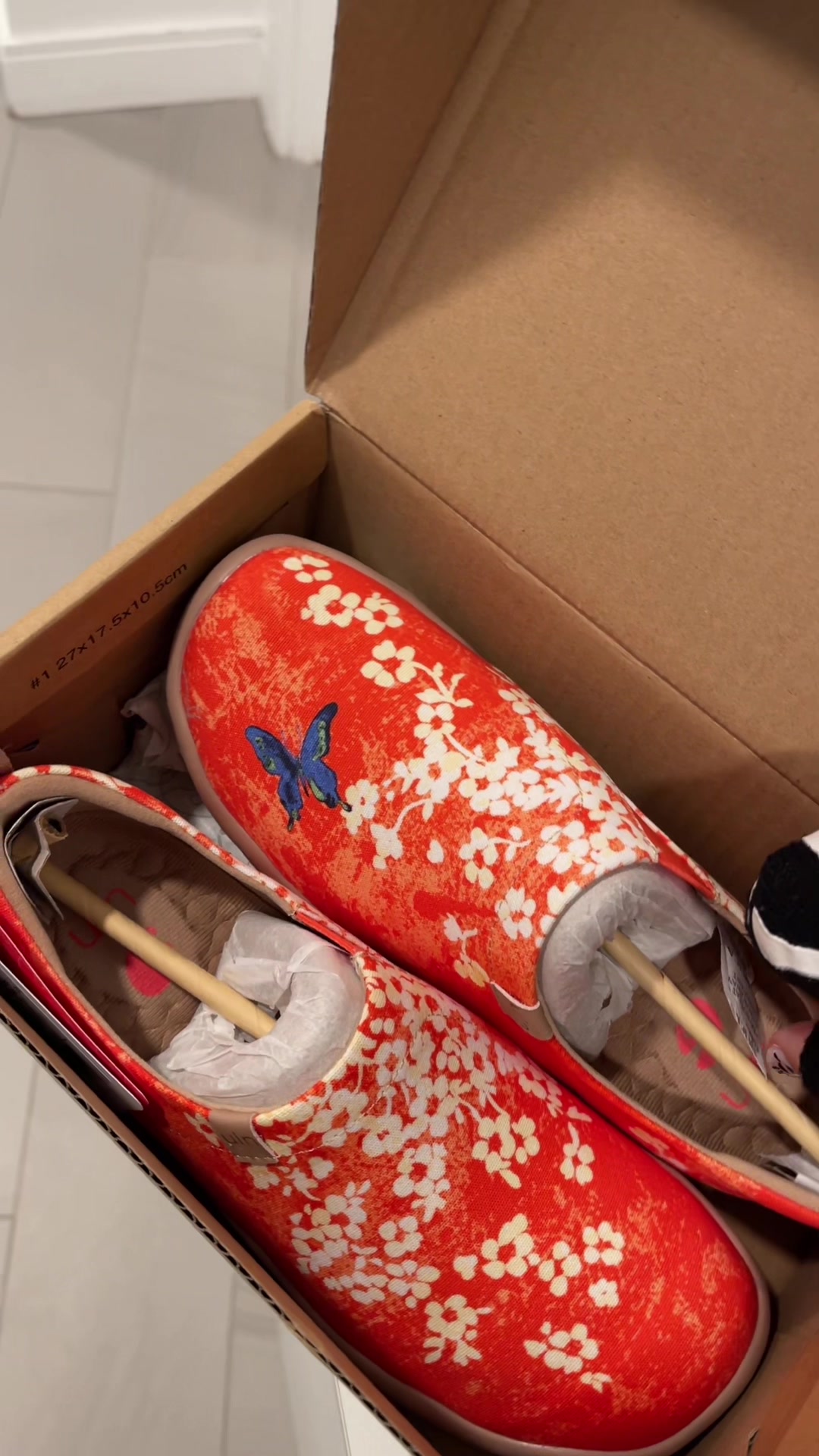 TikTok post by @olianacircus for UIN Footwear. Caption reads: New bright orange flex shoes by @Uin Footwear  I....