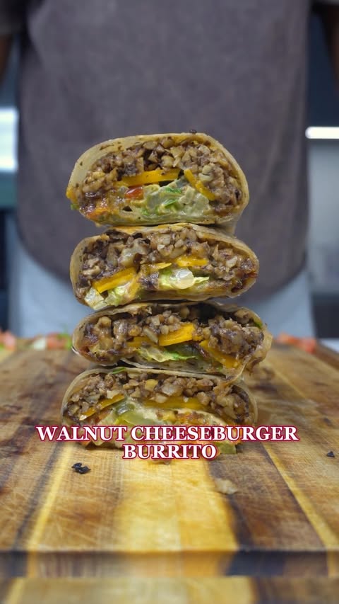 Instagram post by @tappedinwellness for California Walnuts. Caption reads: WALNUT CHEESEBURGER BURRITO Prep Time: 20 minutes....