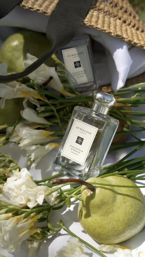 Instagram post by @zhanna.red for Jo Malone London. Caption reads: Better together 🍐🤍 @jomalonelondon English Pear....