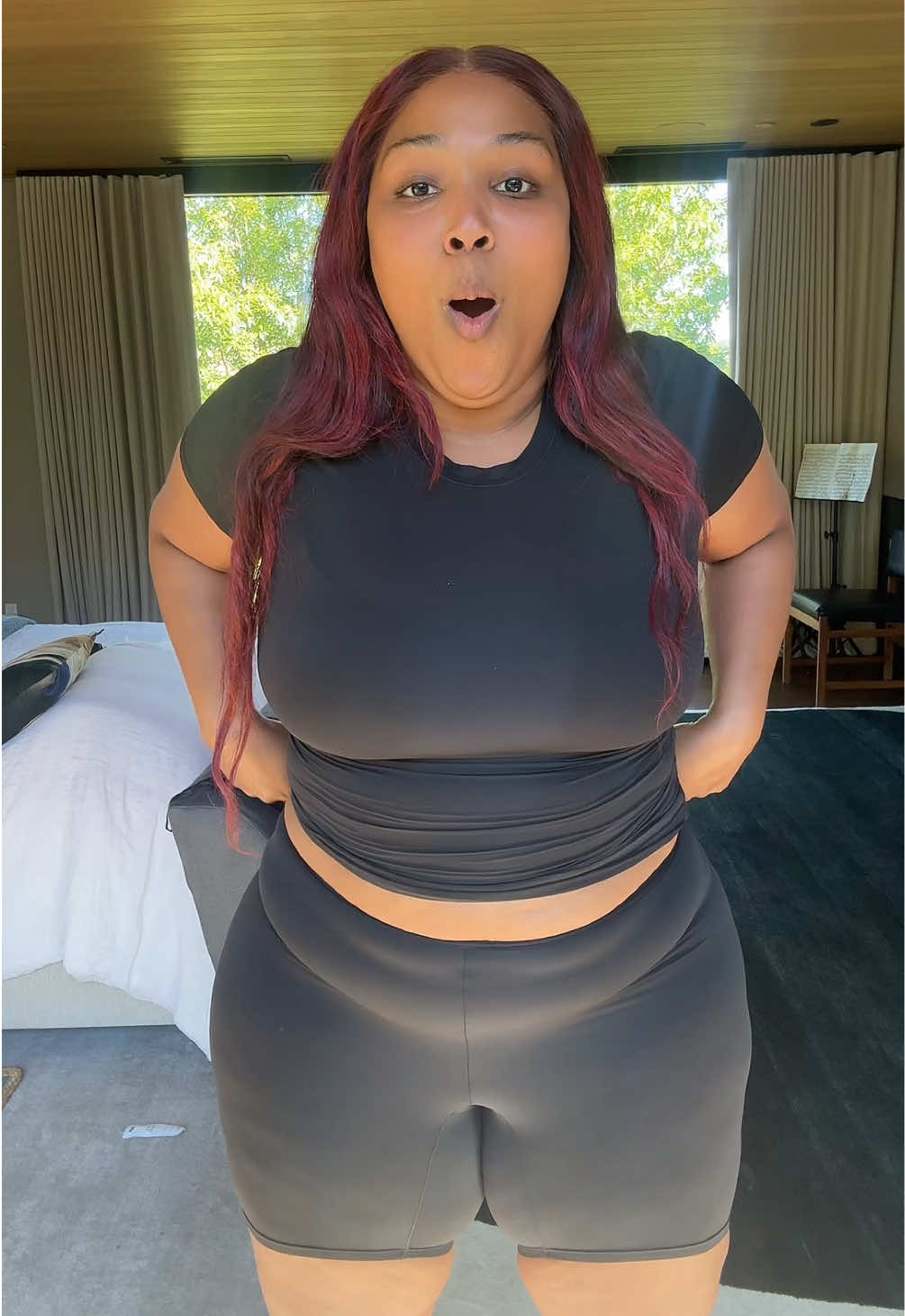 TikTok post by @lizzo for YITTY. Caption reads: INTRODUCING THE ONLY FABRIC YOU’LL EVER NEED!....