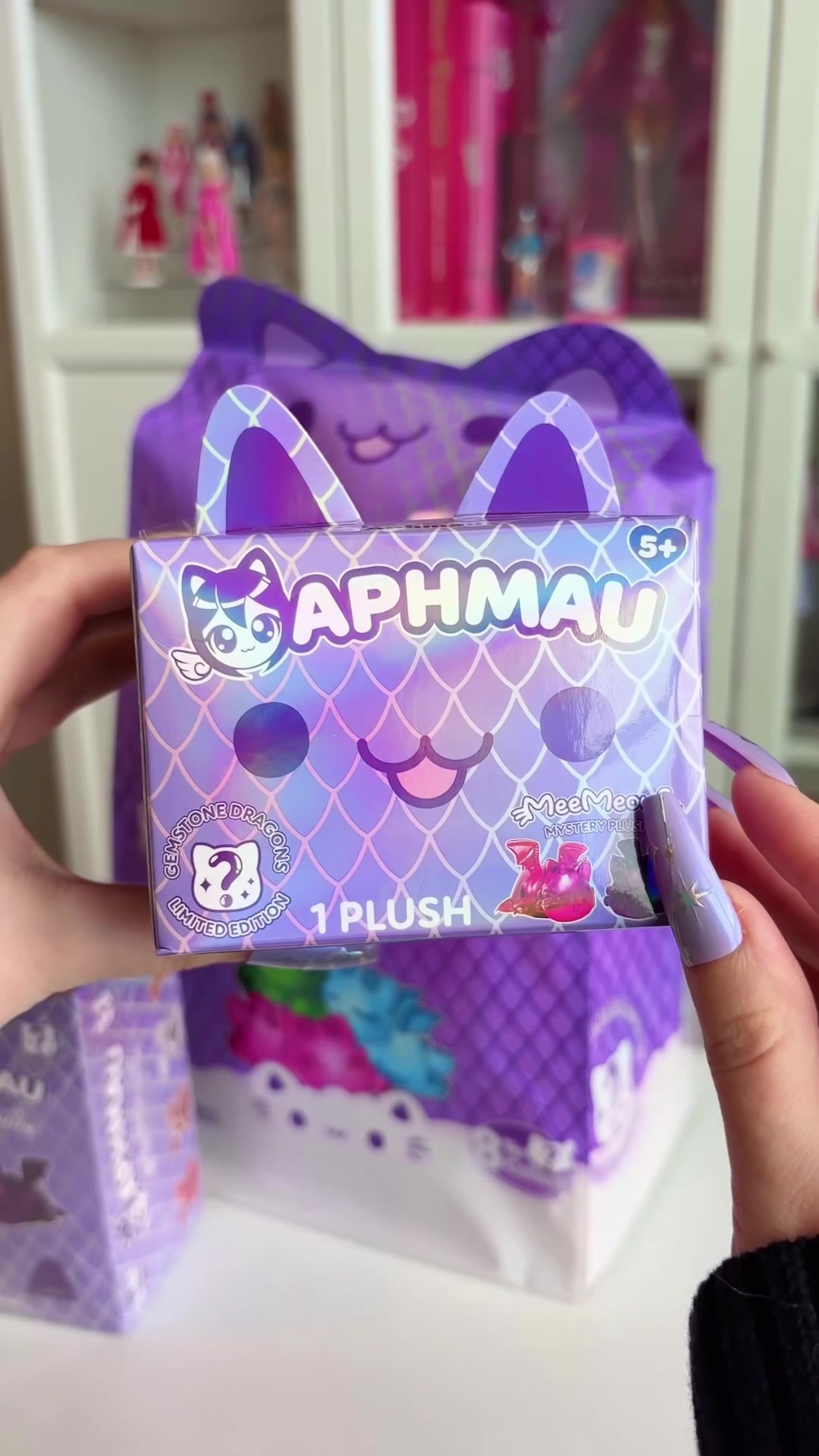 TikTok post by @hibarbiegirls for Bonkers Toys. Caption reads: UNBOXING APHMAU GEMSTONE DRAGONS! @Aphmeow Store....