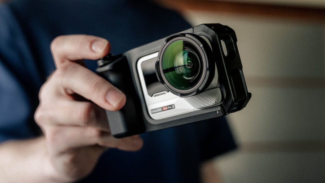 YouTube post by @GeorgeHolden for Moment. Caption reads: This Pocket-Sized "Leica" is a Street Photography....