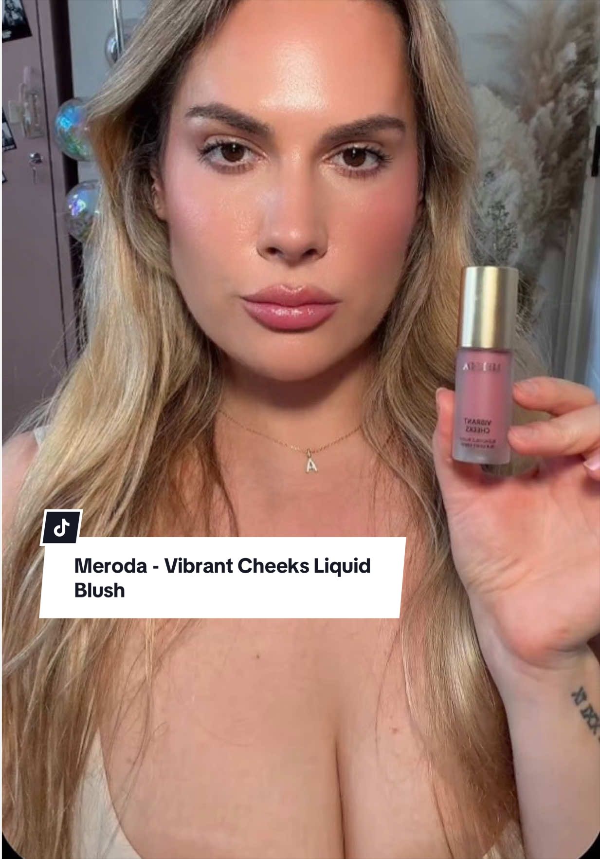 TikTok post by @burcibaci for Meroda Cosmetics. Caption reads: The perfect bendable liquid blush @Meroda....