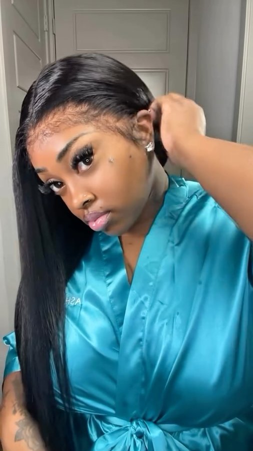 Instagram post by @stylisttraceyshenise for Ashimary Hair. Caption reads: It’s Silk Press Season 🩵 Glueless Kinky Straight....