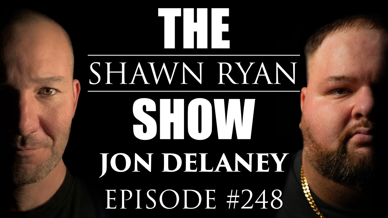 YouTube post by @ShawnRyanShow for ROKA. Caption reads: Jon Delaney – Who's Protecting Jeffrey Epstein's....