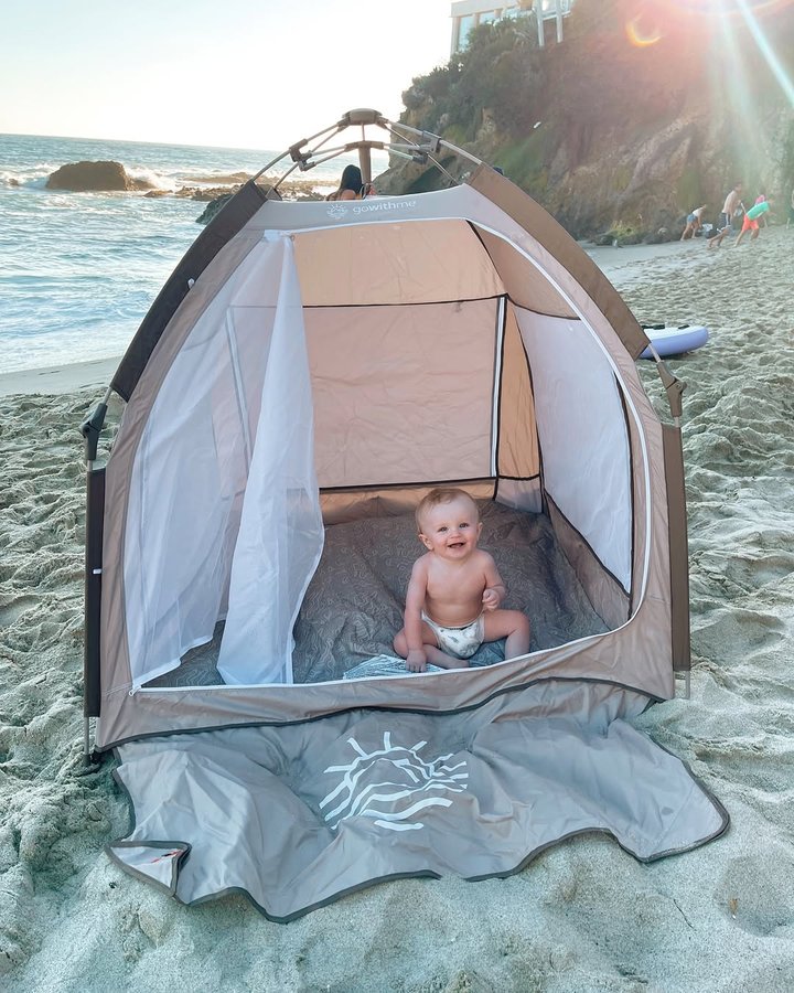 Instagram post by @reallytrishh for Baby Delight. Caption reads: Growing up being walking distance from the beach....