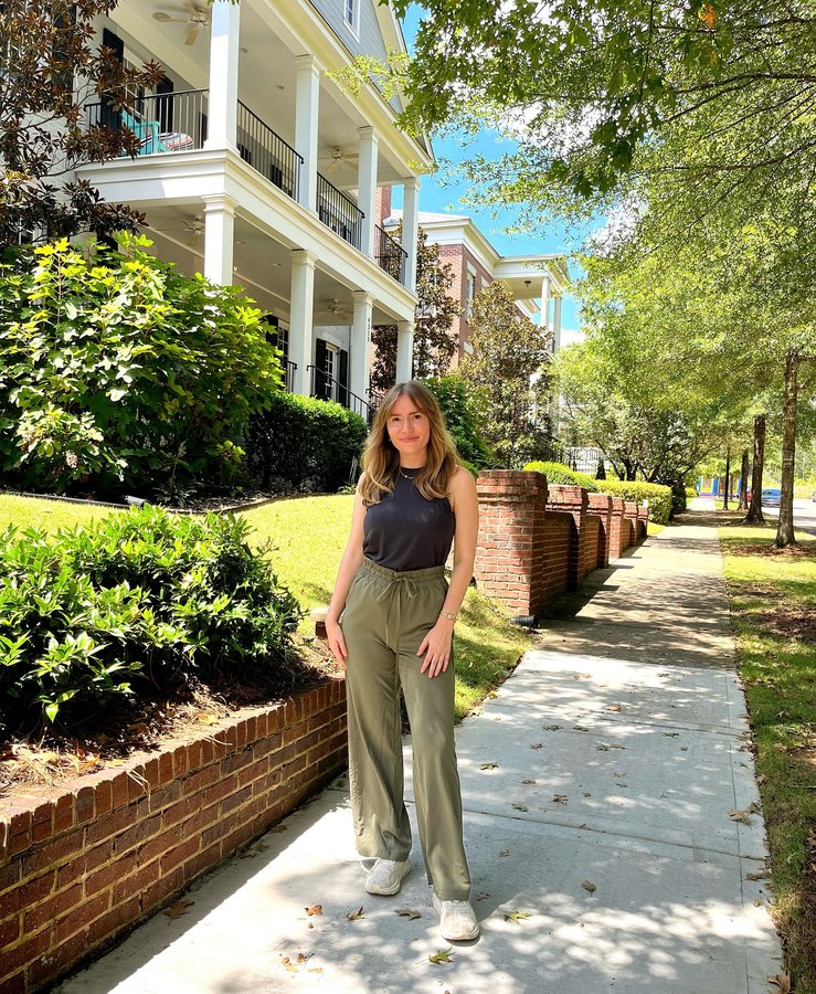 Instagram post by @sunnysidececilia for RBX Active. Caption reads: [...] a moment in time 🥂🍃☀️🍂 wearing new....