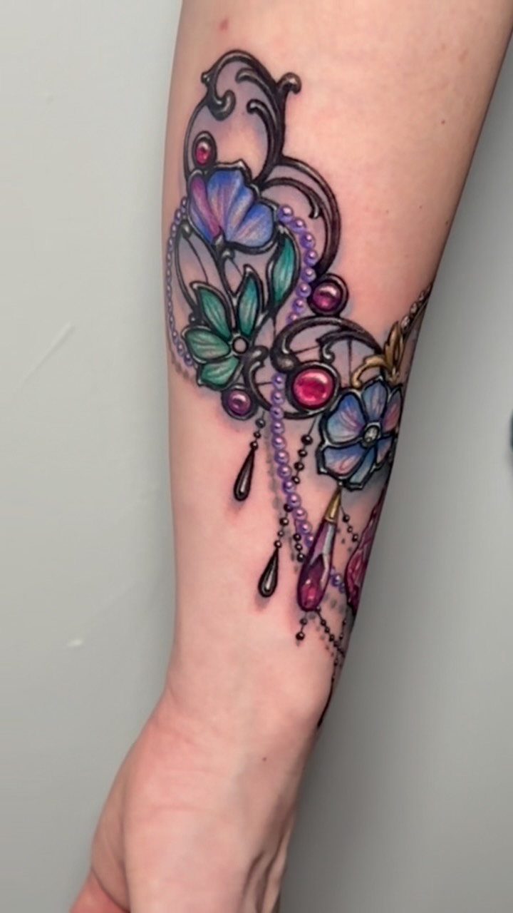 Instagram post by @jennakerrtattoo for Fkirons. Caption reads: Start of a stained glass jewelled piece. A little....