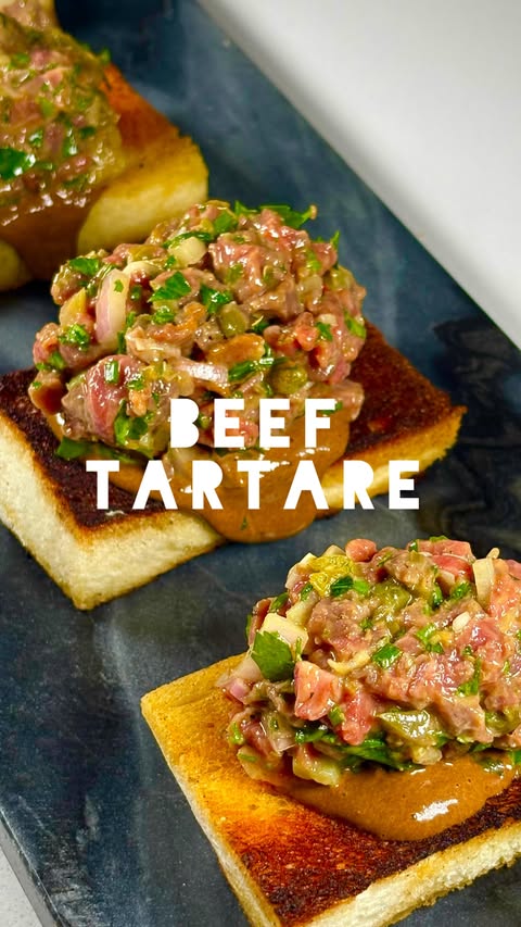 Instagram post by @rob_onthehob for WÜSTHOF. Caption reads: AD | Steak tartare with black garlic + horseradish....