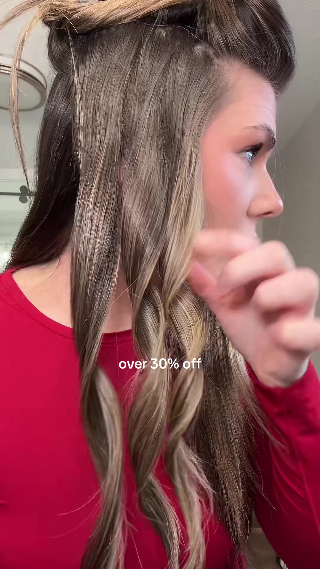 TikTok post by @morg_lucas for Bio Ionic. Caption reads: Bio Ionic Long Barrel Curling Iron 1” [...].