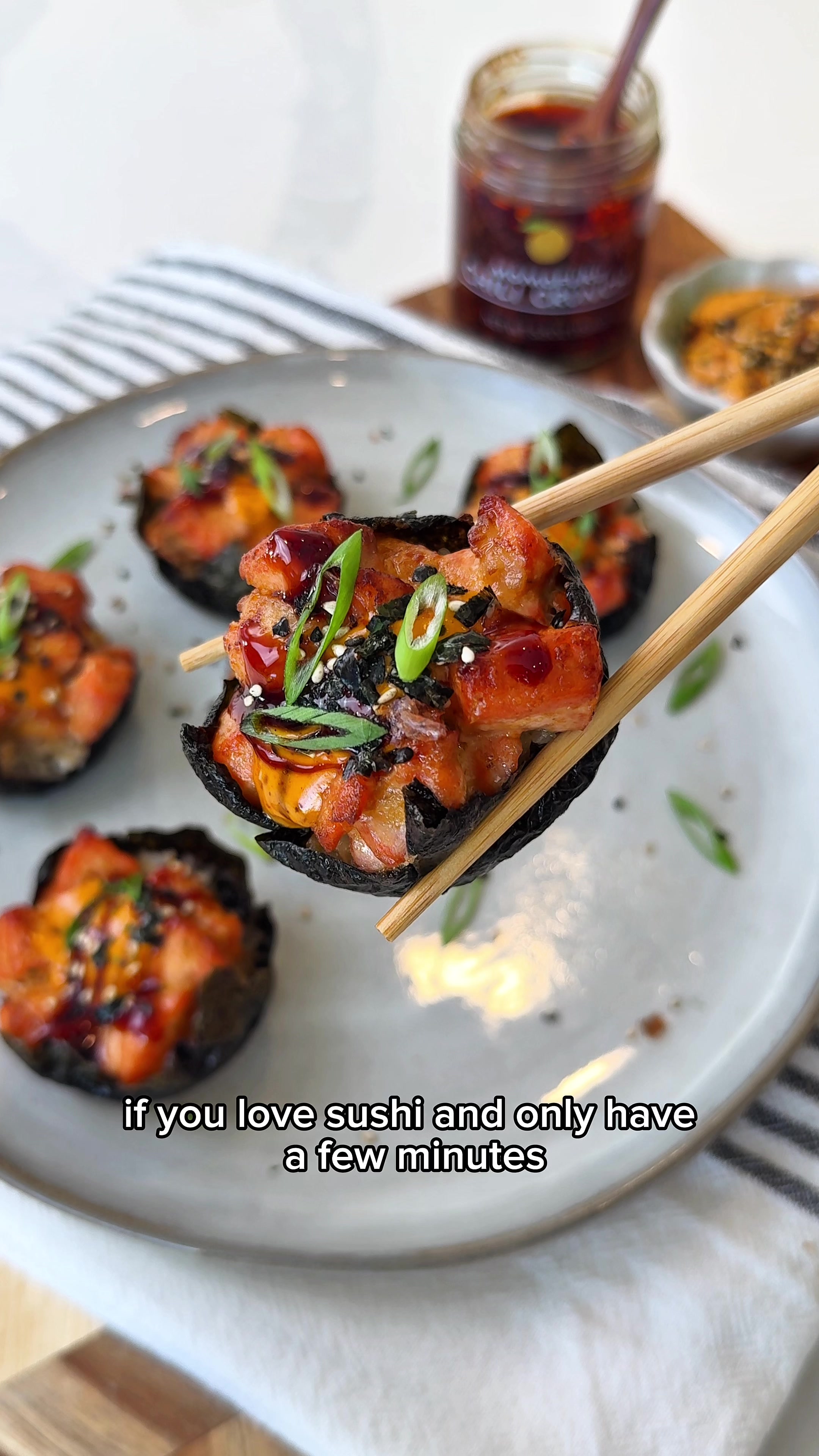 TikTok post by @thesavorychopstick for Momofuku. Caption reads: [...] Baked rice cups topped with salmon and....