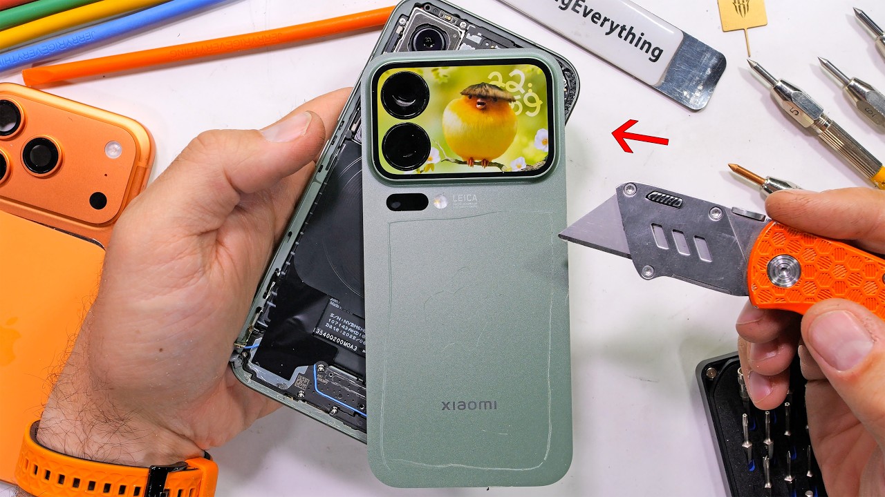 YouTube post by @JerryRigEverything for iFixit. Caption reads: Xiaomi 17 Pro vs iPhone 17 Pro -- Attack of the....