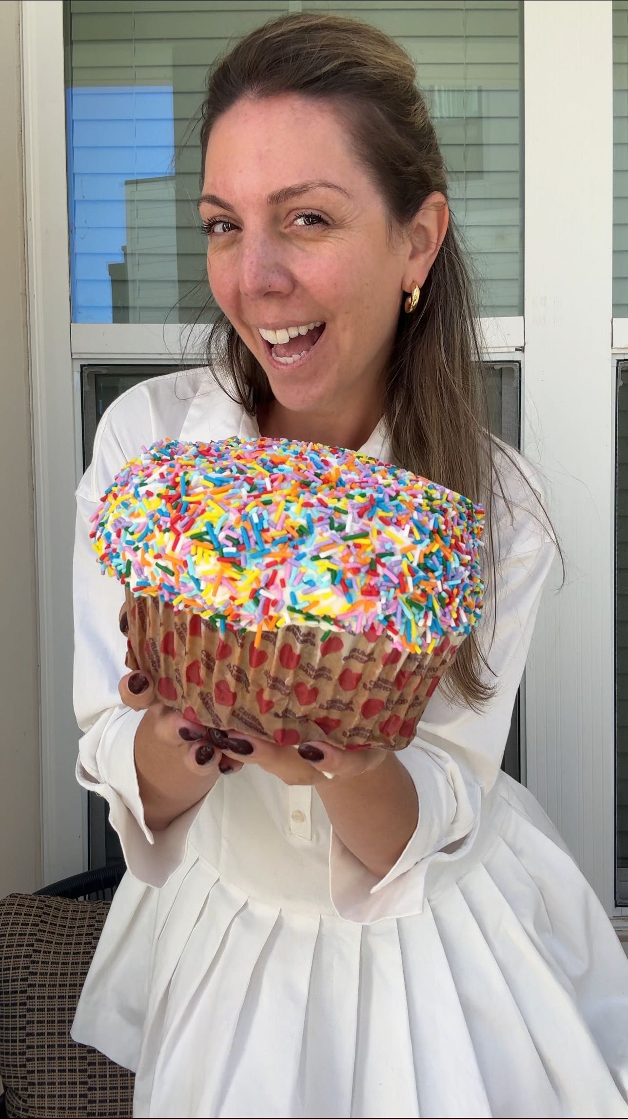 Instagram post by @sliceofclt for Original Crumbs. Caption reads: The Colossal Cupcake is HERE at Harris....