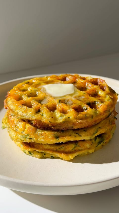 Instagram post by @mydarr for The Feedfeed. Caption reads: #AD Comment ‘RECIPE’ to have this Zucchini Waffle....