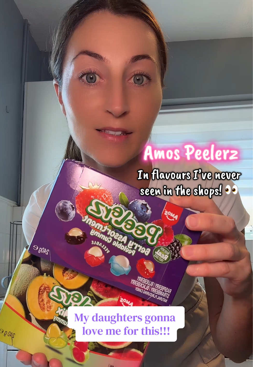 TikTok post by @busymummyof3 for Amos Sweets. Caption reads: [...] with a FREE GIFT! Never seen these @AMOS....