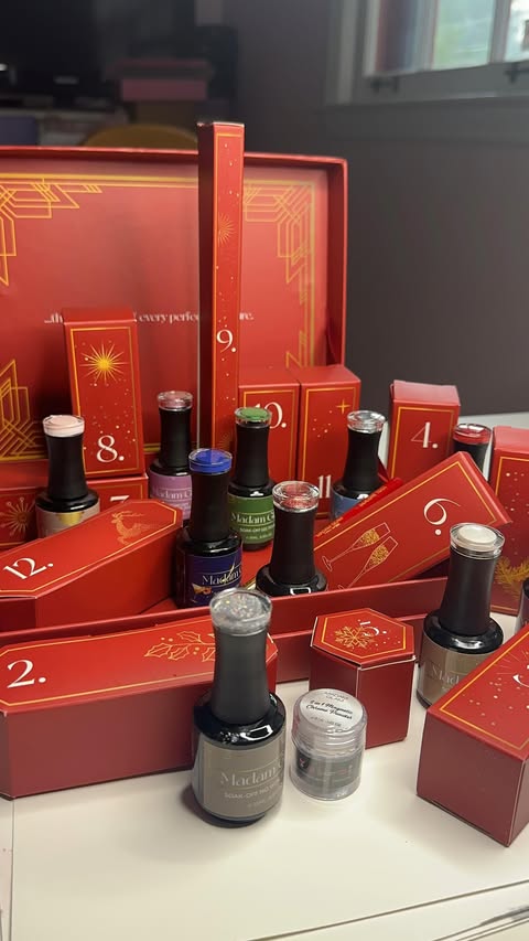 Instagram post by @nails_by_lindsay_ for Madam Glam. Caption reads: SPOILER ALERT 🚨 • #adventcalendars @madam_glam....