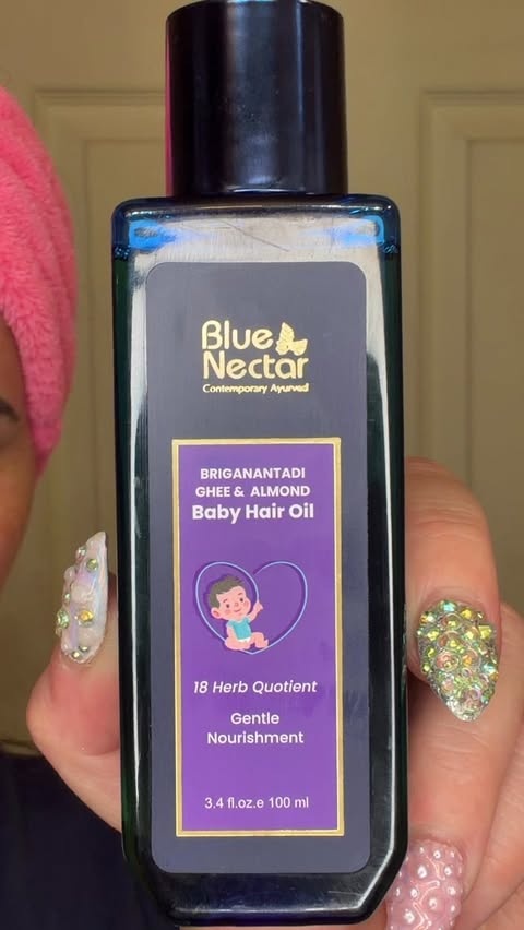 Instagram post by @angelcitro for Blue Nectar. Caption reads: [...] out on Amazon #babyhair #babyhairoil....