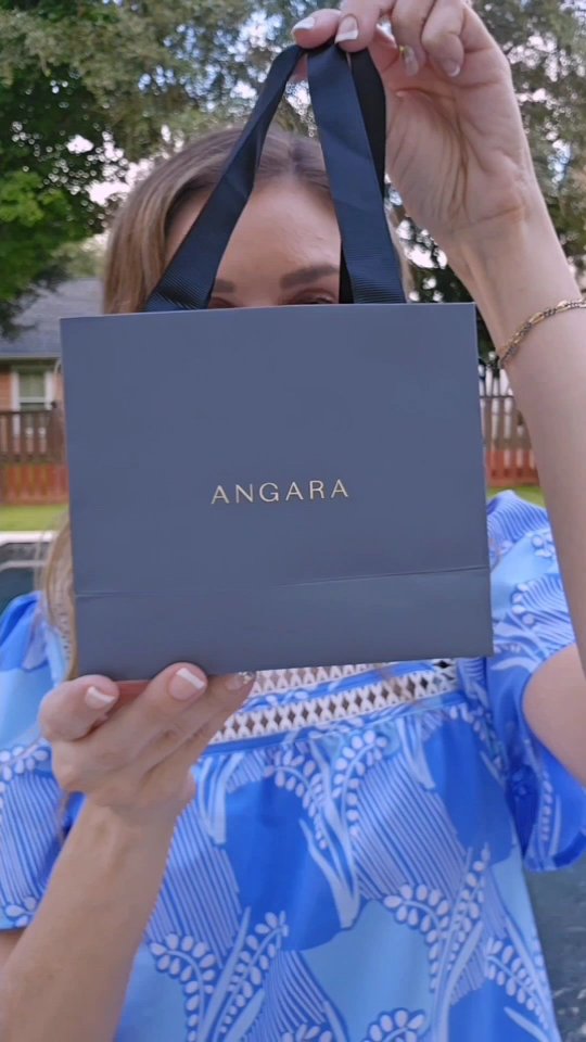 Instagram post by an influencer for Angara. Caption reads: [...] dreams✨ Wearing this stunning @angarajewelry....