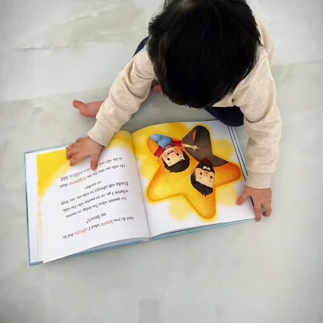 Instagram post by an influencer for MyStoryTale Books. Caption reads: [...] book for daddy from @mystorytalebooks I love....