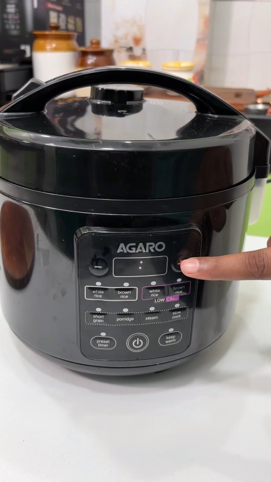 Instagram post by @ammakithaali for AGARO Lifestyle. Caption reads: Say goodbye to soggy or undercooked rice! The....