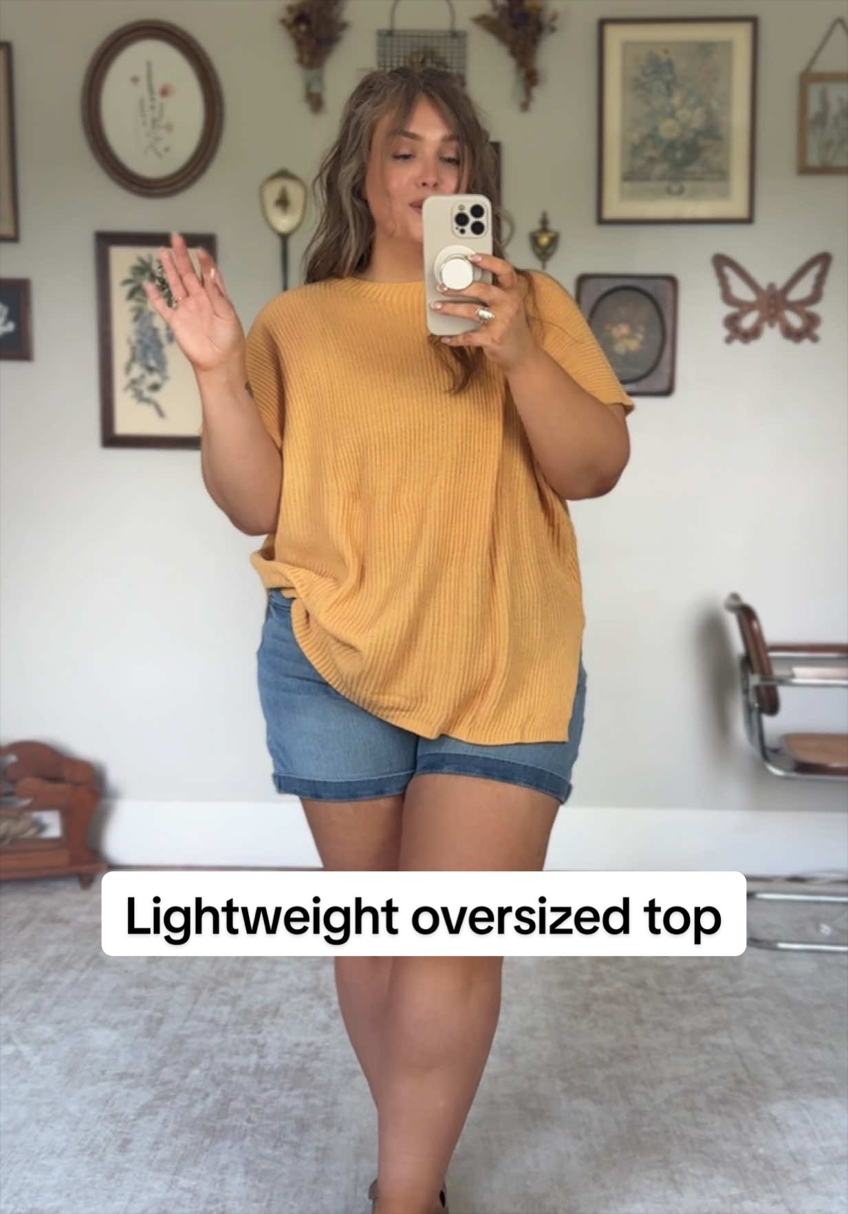 TikTok post by @deals.and.daisies for Shewin Official US. Caption reads: The perfect oversized top for a curvy body.....