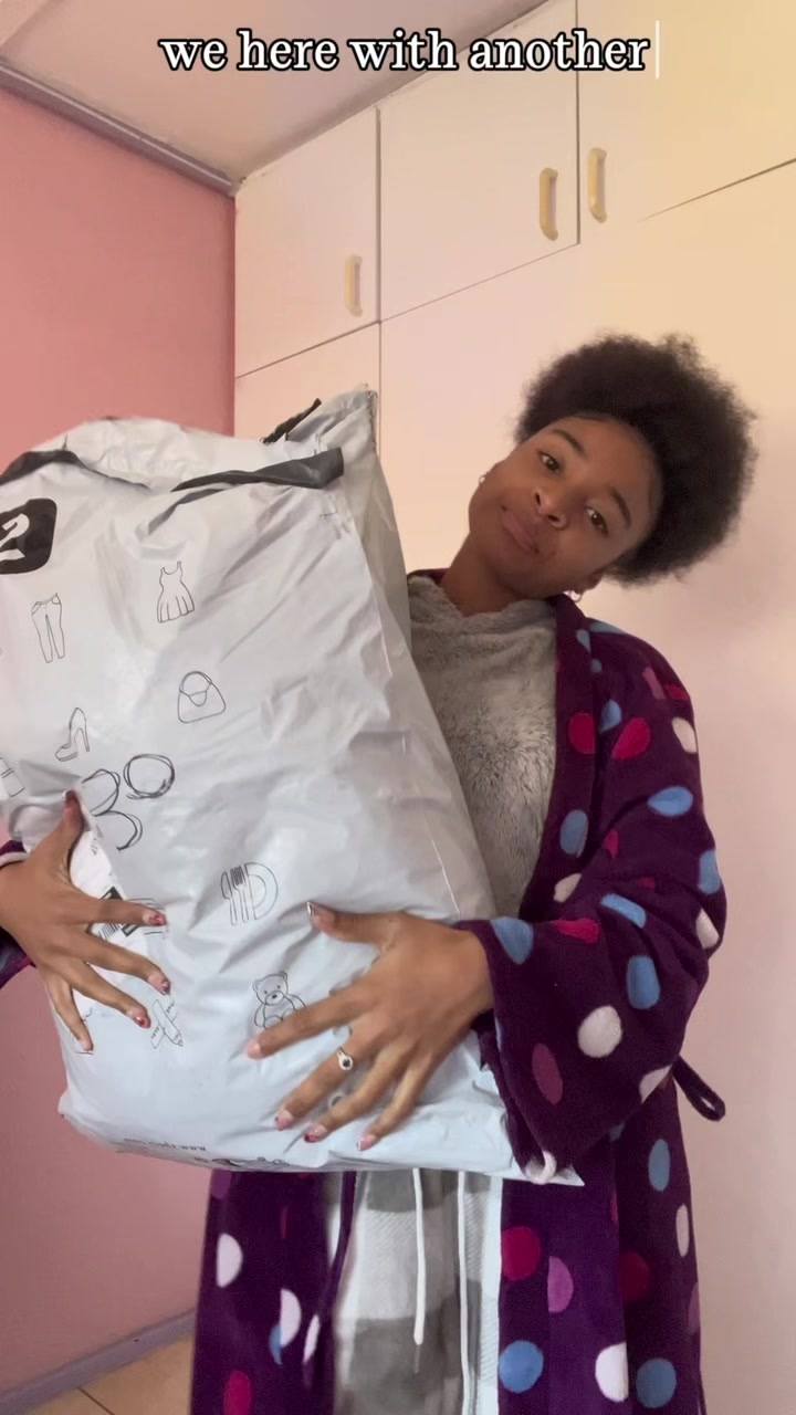TikTok post by @its_afrogirl for VARSITIE. Caption reads: SHEIN Fit Check Challenge! Search S4F3L on SHEIN....