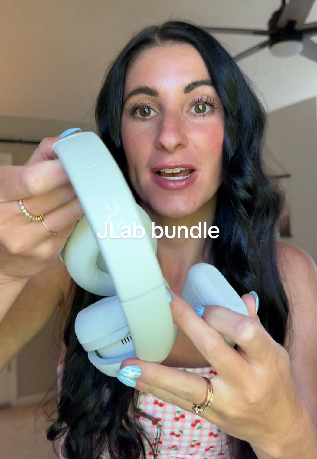TikTok post by @kennyshopsalot for JLab. Caption reads: Replying to @jenessa🖤 This @JLab bundle is a....