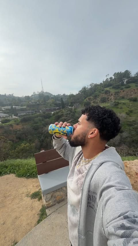 Instagram post by @brizzzworks for C4 Energy. Caption reads: [...] in love with here in LA, hiking ⛰️....